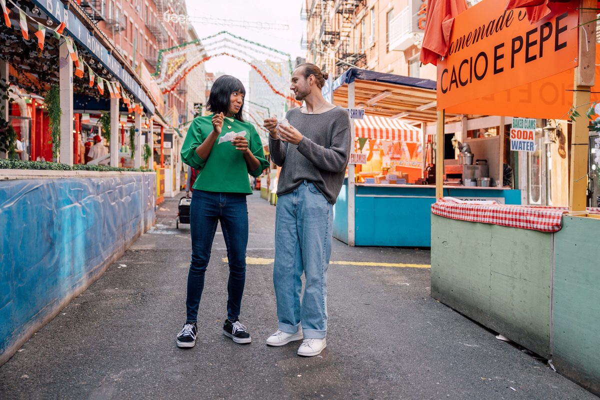 110 Romantic And Fun Date Ideas To Spark A Connection - couples enjoying in a street fair